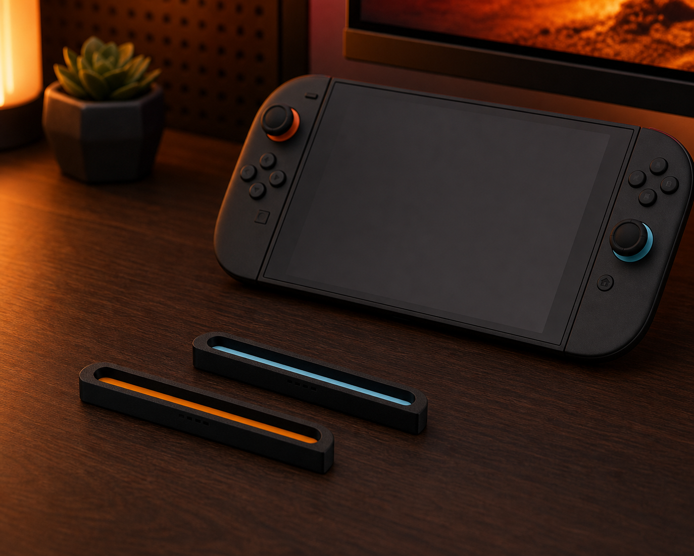 Pair of black magnetic controller dust covers with orange and blue accent channels on a gaming desk