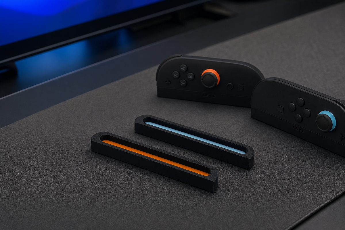 Magnetic controller dust covers in use on a compatible handheld gaming console