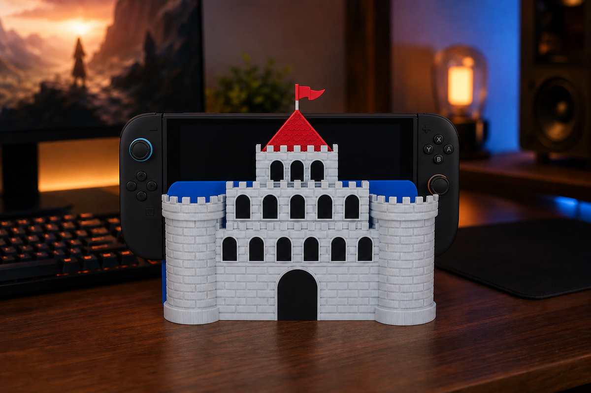Castle-style dock accent with empty side towers fitted around a blue-backed Nintendo Switch 2 on a gaming desk